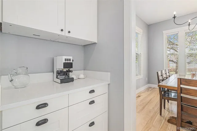 a spacious bedroom with a bed and a window