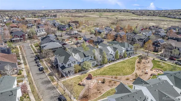 an aerial view of a house with a lake view