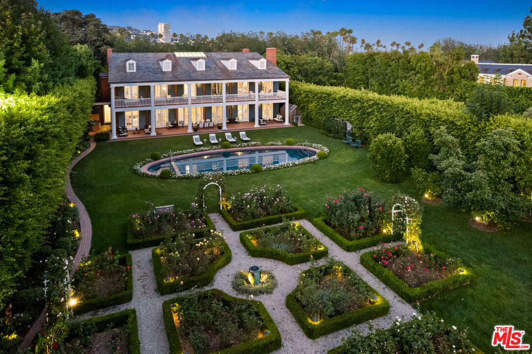 805 North Alpine Drive Beverly Hills, CA 90210 - Photo 1 of 48 an aerial view of a house with a garden