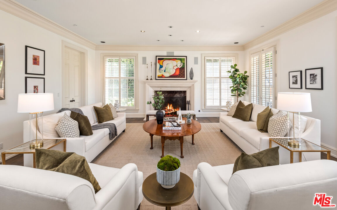 805 North Alpine Drive Beverly Hills, CA 90210 - Photo 12 of 48 a living room with furniture flower pot and a window