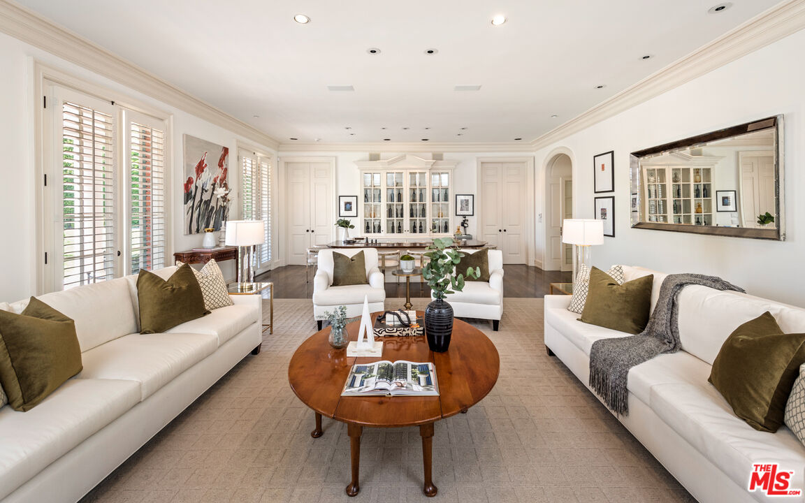 805 North Alpine Drive Beverly Hills, CA 90210 - Photo 13 of 48 a living room with furniture and a large window