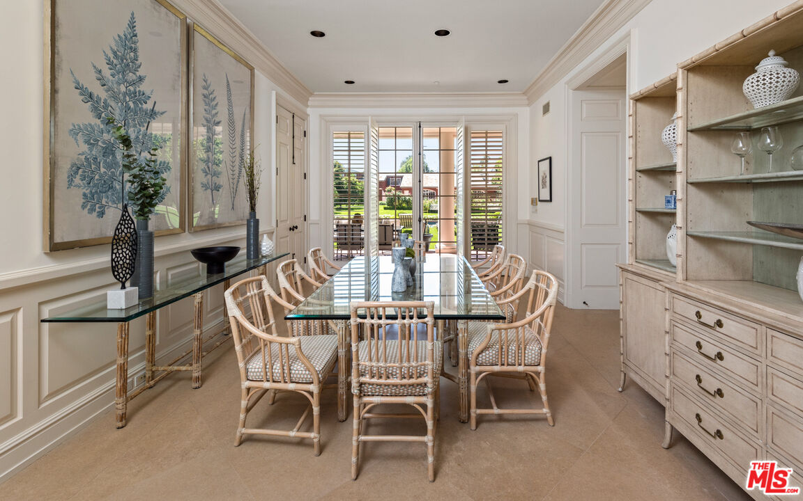 805 North Alpine Drive Beverly Hills, CA 90210 - Photo 16 of 48 a dining room with furniture and window