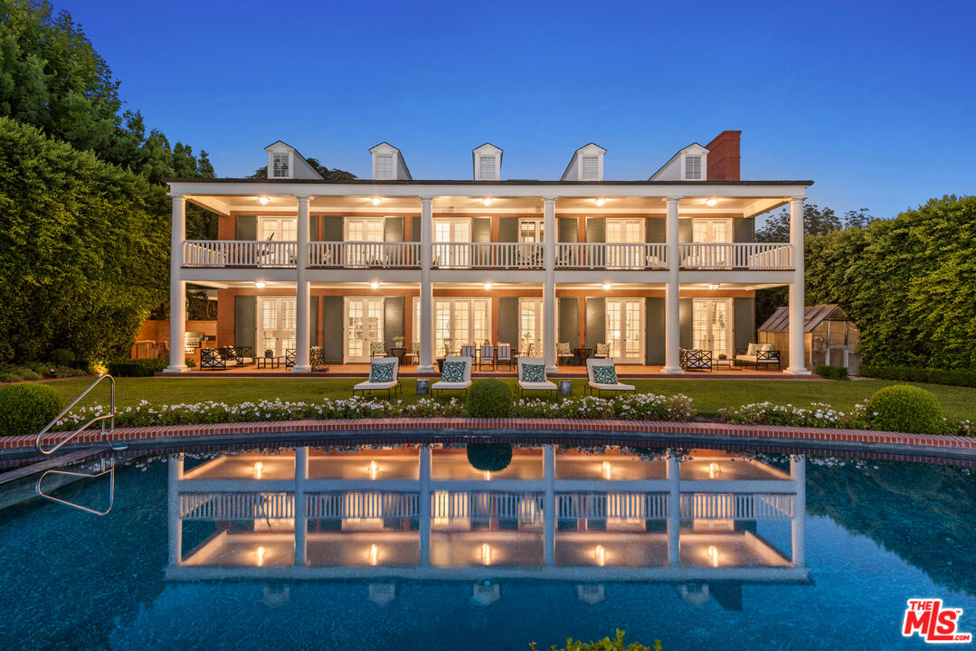 805 North Alpine Drive Beverly Hills, CA 90210 - Photo 2 of 48 front view of a house with swimming pool