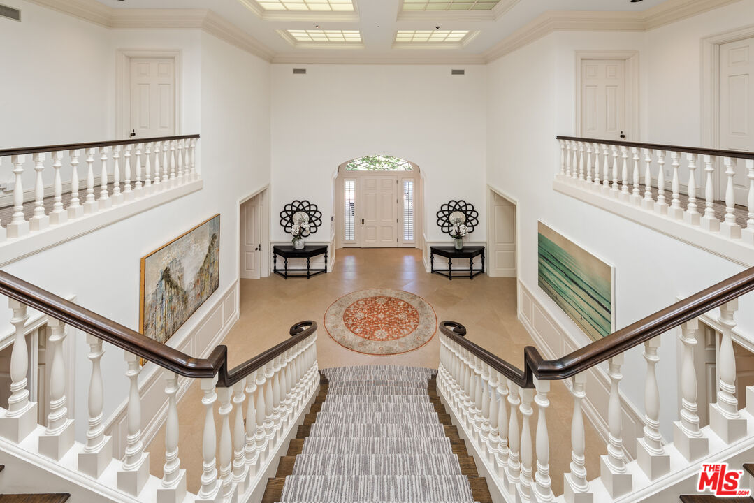 805 North Alpine Drive Beverly Hills, CA 90210 - Photo 22 of 48 a view of an entryway with wooden floor