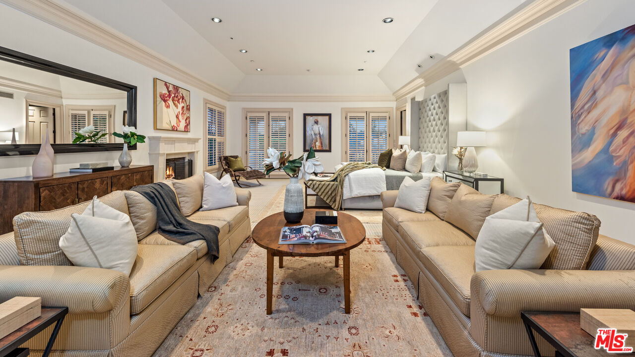 805 North Alpine Drive Beverly Hills, CA 90210 - Photo 24 of 48 a living room with furniture and a large window