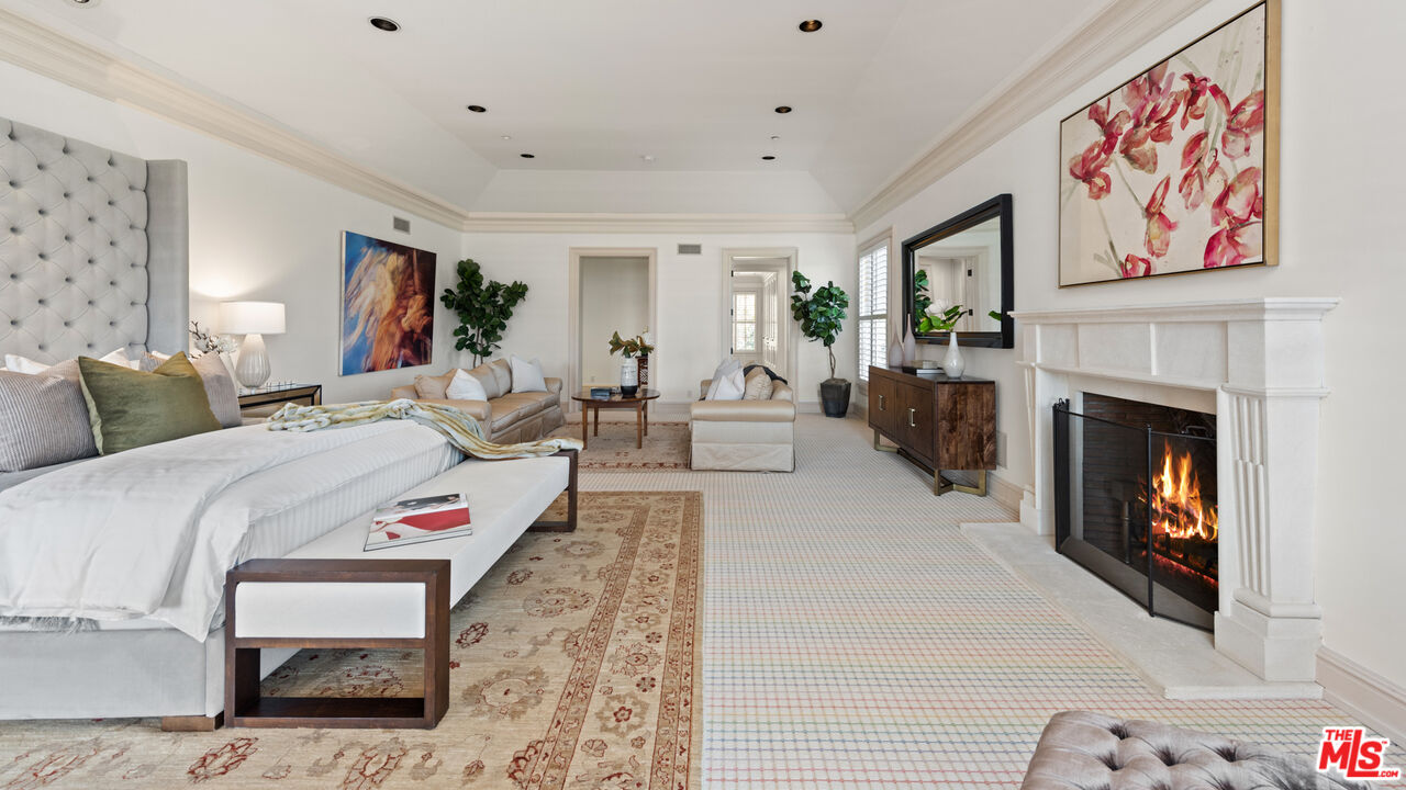 805 North Alpine Drive Beverly Hills, CA 90210 - Photo 26 of 48 a living room with furniture and a fireplace