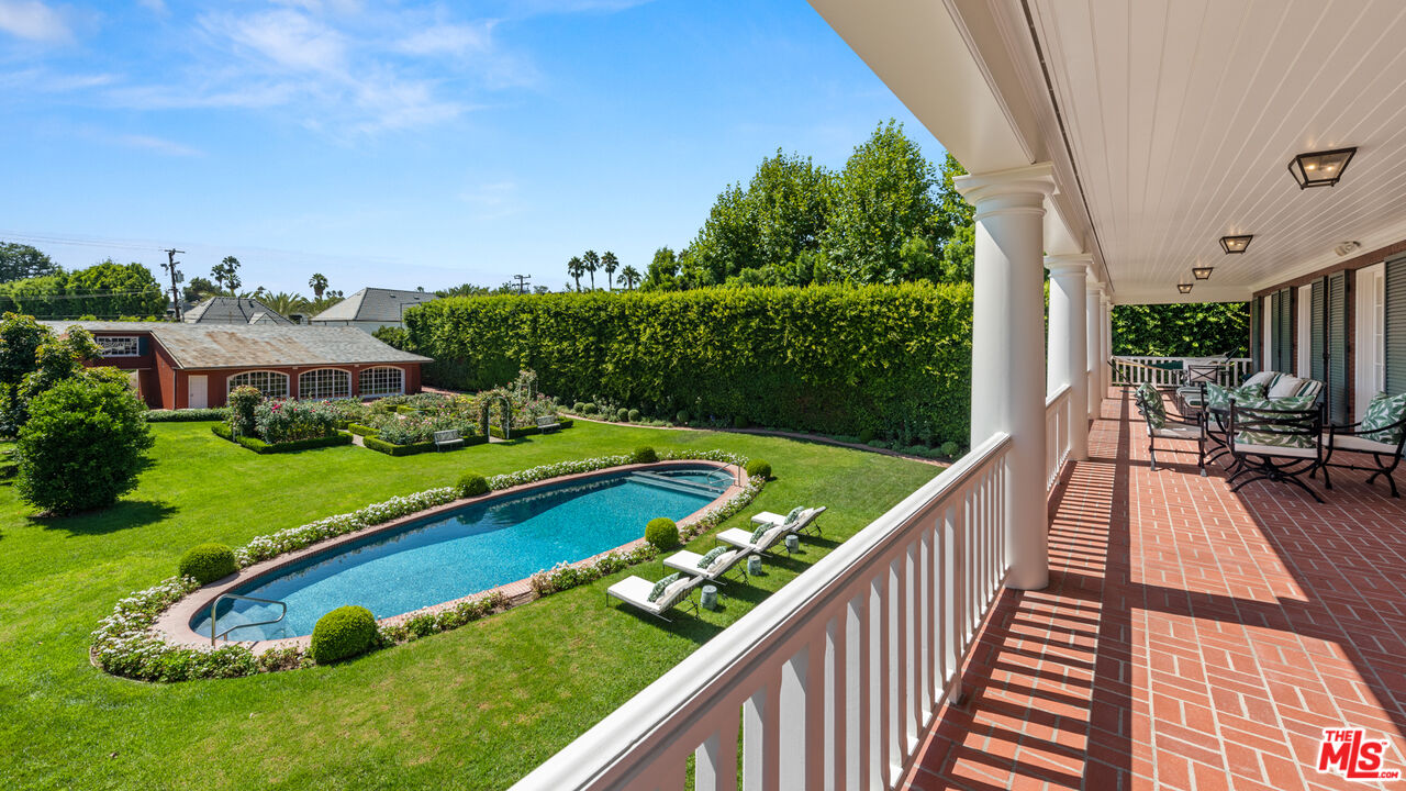 805 North Alpine Drive Beverly Hills, CA 90210 - Photo 27 of 48 a view of swimming pool with a patio