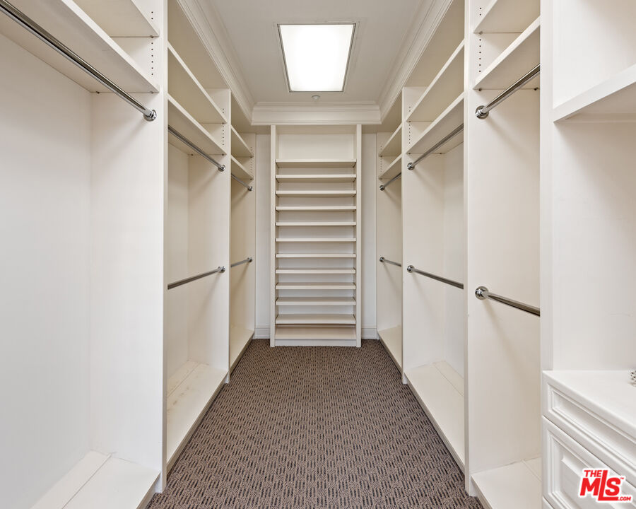 805 North Alpine Drive Beverly Hills, CA 90210 - Photo 34 of 48 a view of closet area with stairs