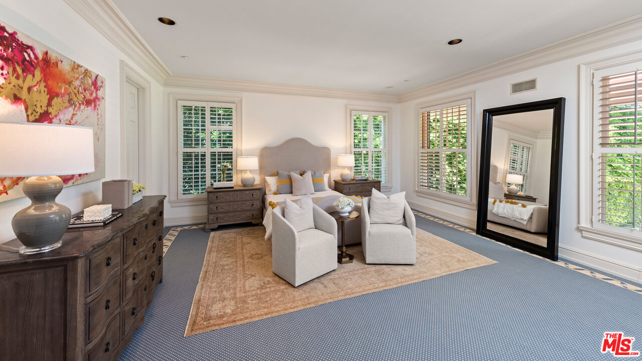 805 North Alpine Drive Beverly Hills, CA 90210 - Photo 35 of 48 a living room with furniture and a window