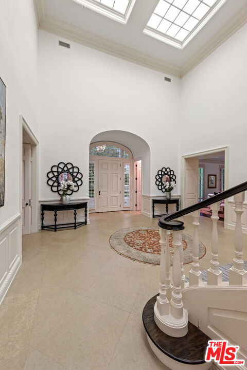 805 North Alpine Drive Beverly Hills, CA 90210 - Photo 7 of 48 a living room with furniture and a fireplace
