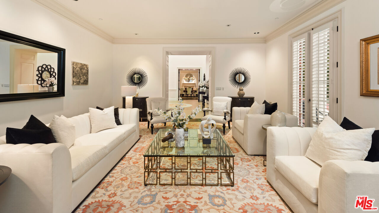 805 North Alpine Drive Beverly Hills, CA 90210 - Photo 8 of 48 a living room with furniture and a large window
