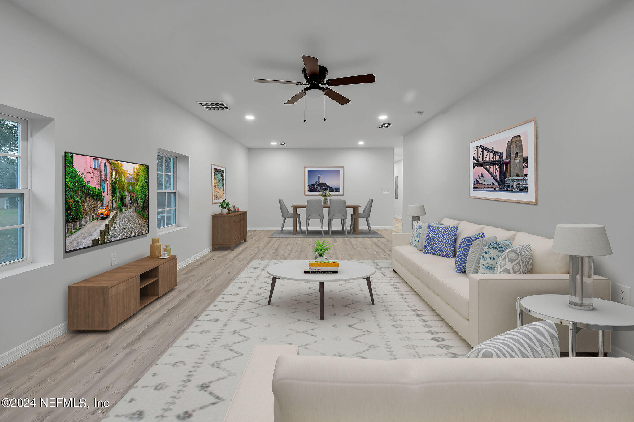7519 Birdies Road Jacksonville, FL 32256 - Photo 2 of 24 a living room with furniture and a flat screen tv