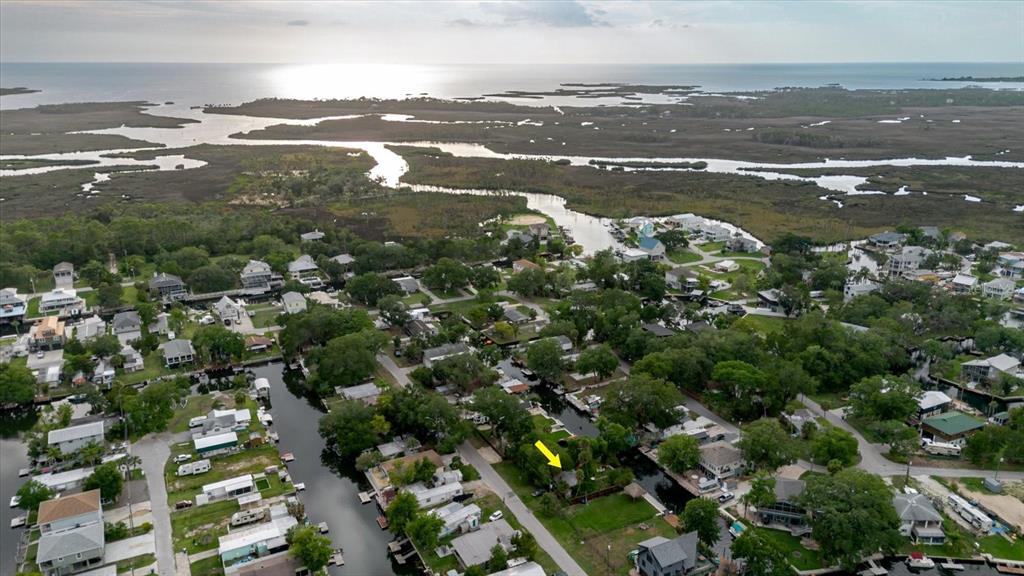 5323 Circle Drive Weeki Wachee, FL 34607 - Photo 19 of 77 an aerial view of residential building with parking and ocean view