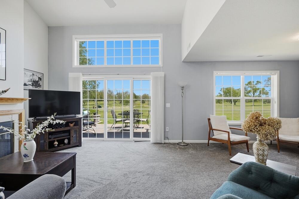 N16W26512 Golf View Lane, Unit E Pewaukee, WI 53072 - Photo 9 of 36 Living Room with Views of Golf Course