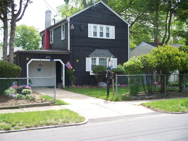 183 Denver Street Springfield, MA 01109 - Photo 1 of 4 a front view of a house with a yard
