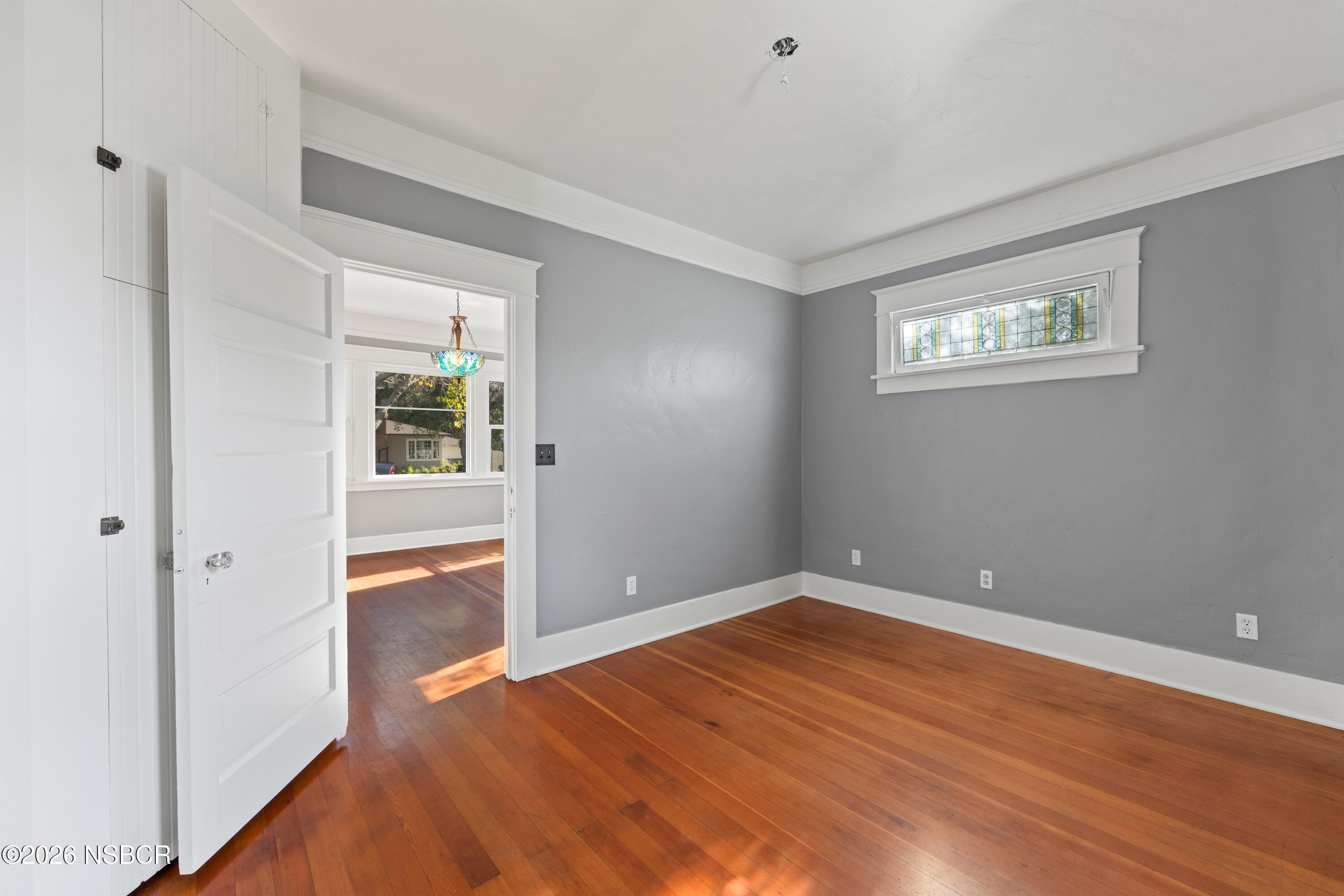 533 Pine Street Solvang, CA 93463 - Photo 13 of 37 a view of empty room with wooden floor and fan