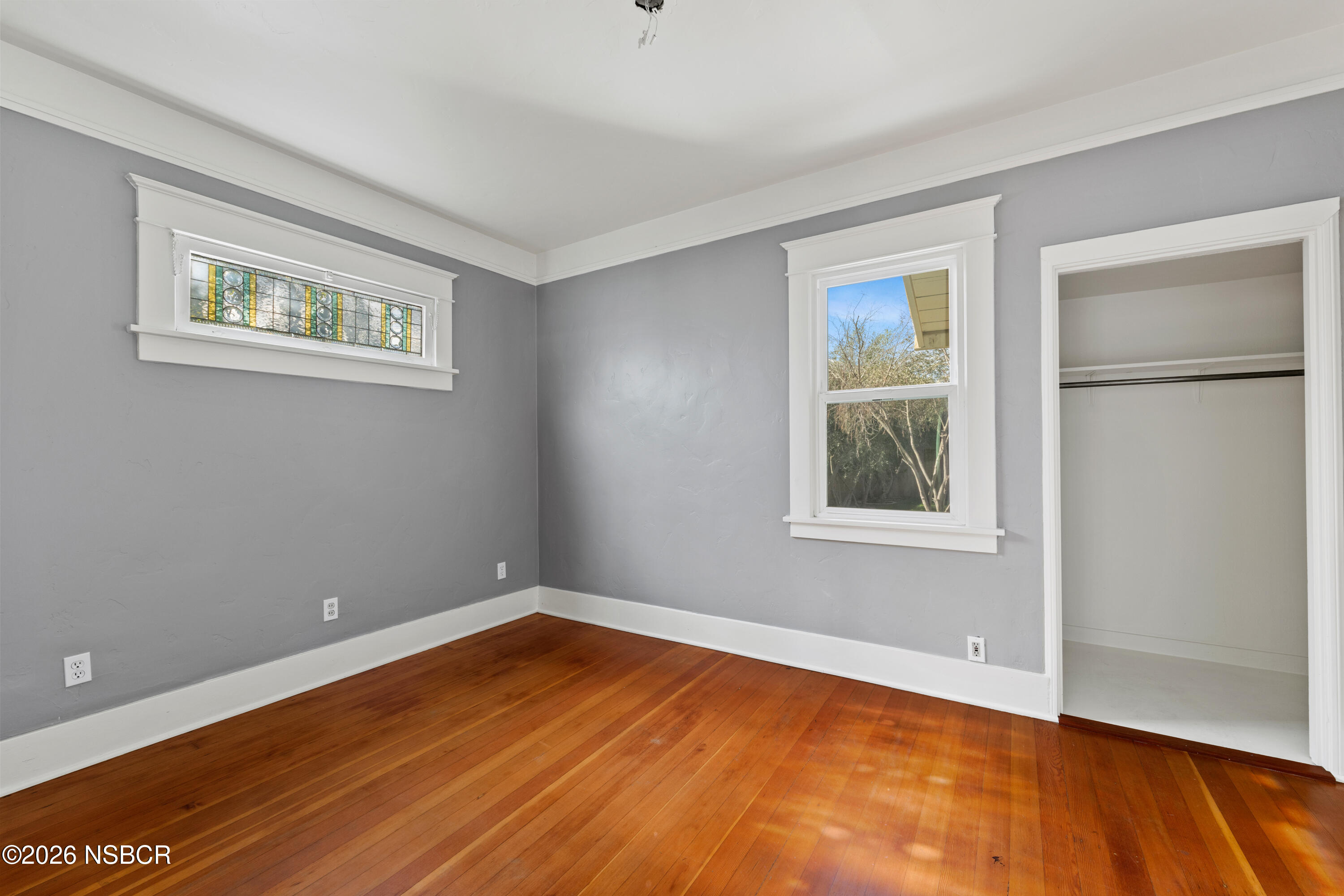 533 Pine Street Solvang, CA 93463 - Photo 14 of 37 a view of empty room with wooden floor and fan