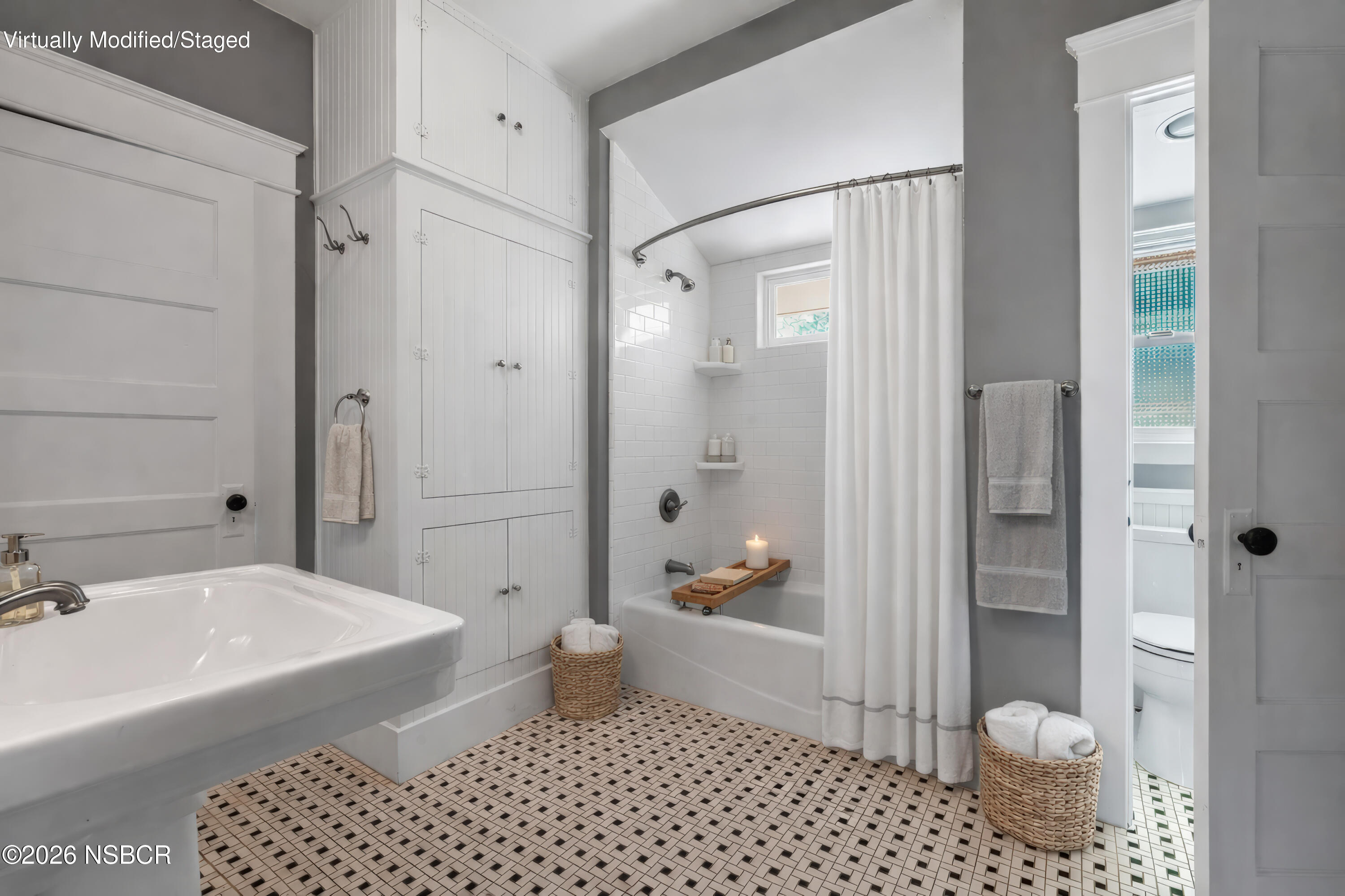 533 Pine Street Solvang, CA 93463 - Photo 16 of 37 a bathroom with a sink a toilet and shower