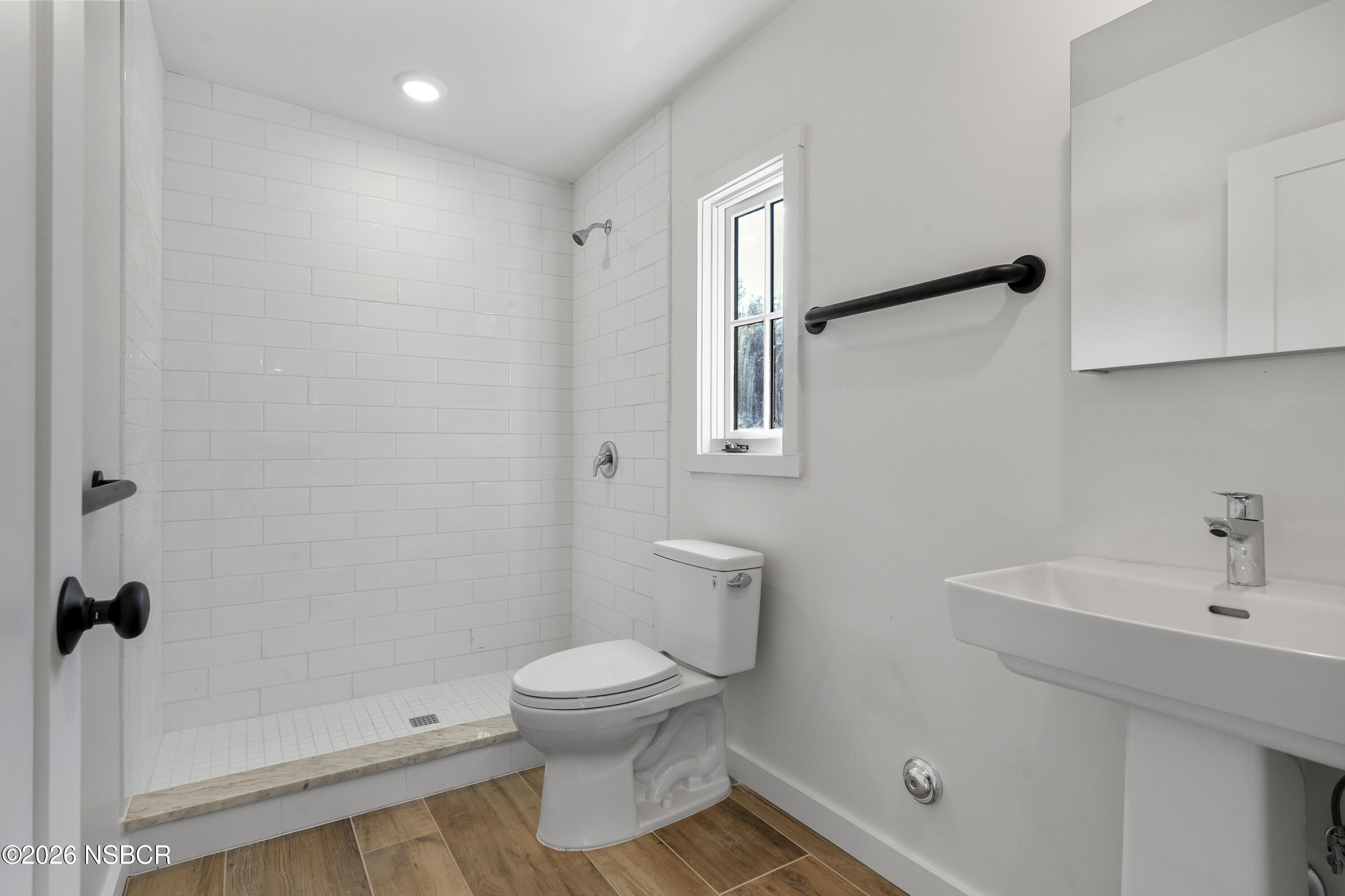 533 Pine Street Solvang, CA 93463 - Photo 27 of 37 a bathroom with a sink and a toilet