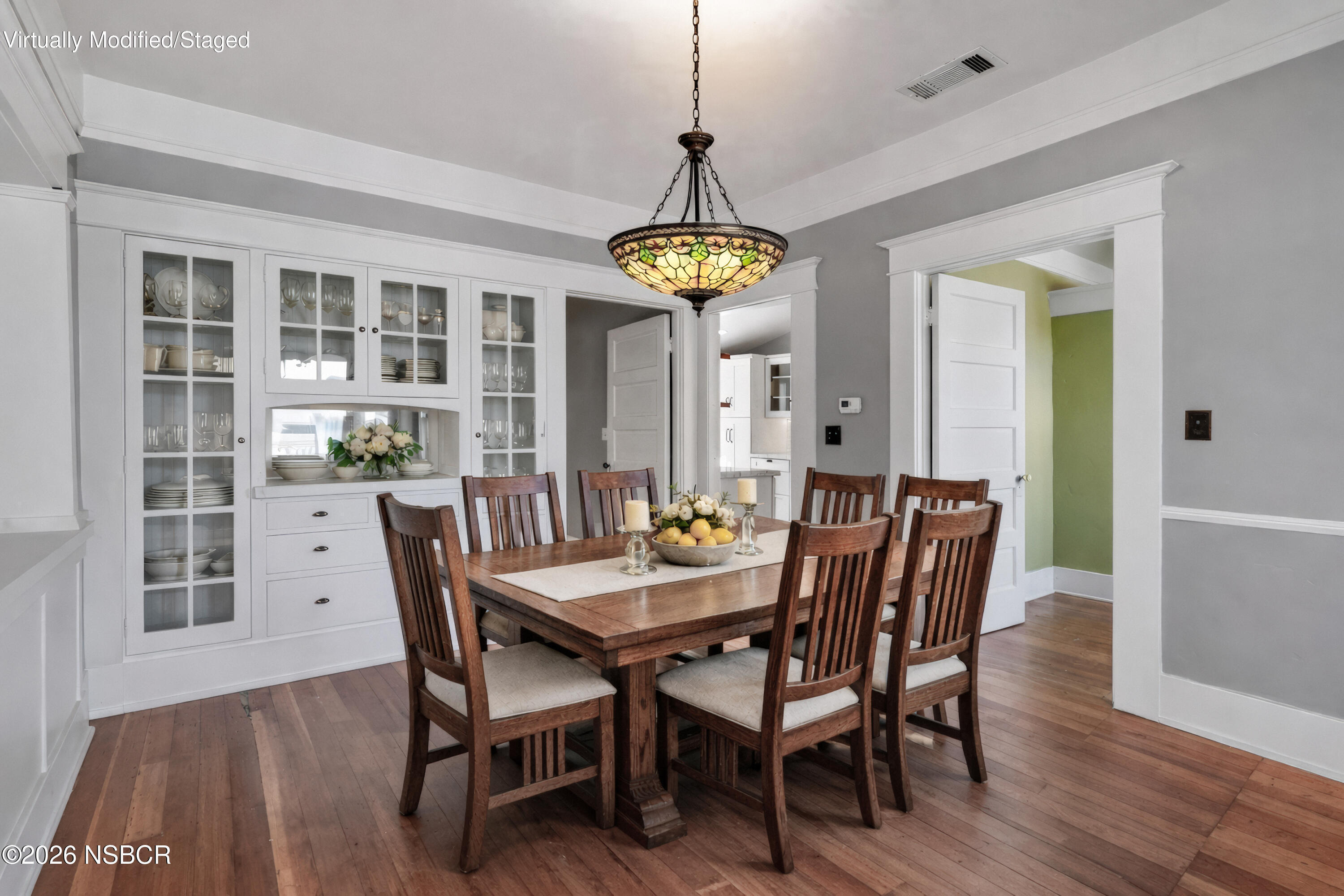 533 Pine Street Solvang, CA 93463 - Photo 5 of 37 a dining room with furniture a chandelier and wooden floor