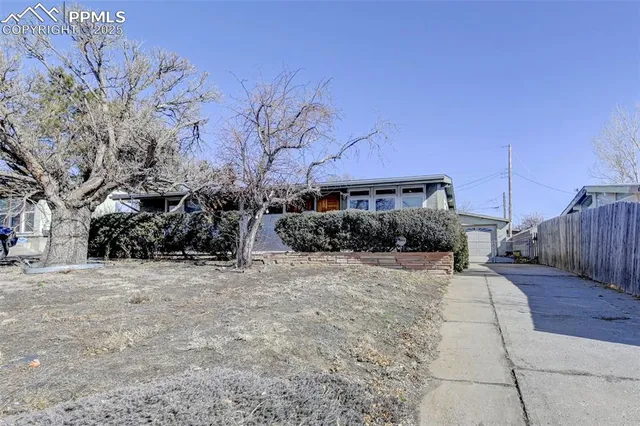 a street view with wooden fence
