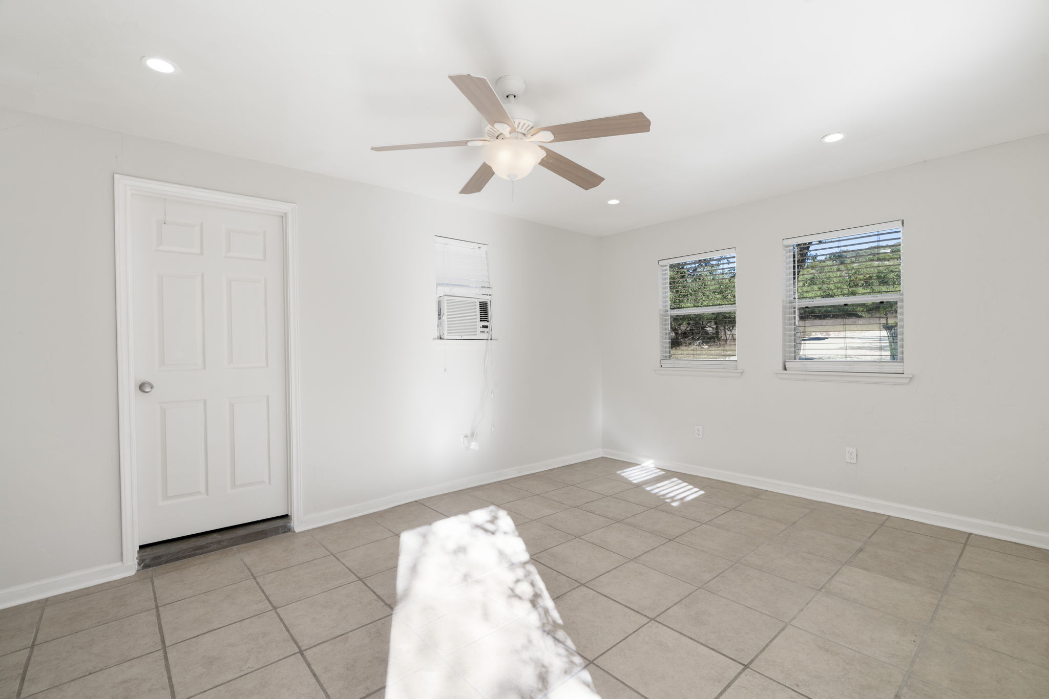 2058 Montell Road Wimberley, TX 78676 - Photo 19 of 35 a view of an empty room with a window