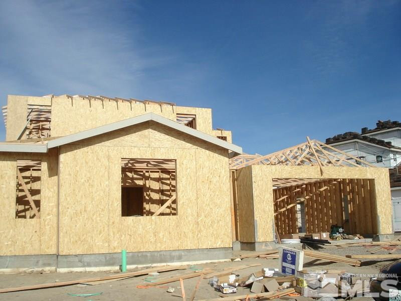 10395 Rollins Drive Reno, NV 89521 - Photo 1 of 1 a view of a brick house with a large window
