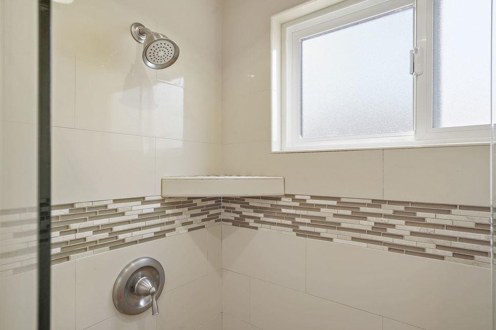 222 Thomas Drive Los Gatos, CA 95032 - Photo 12 of 28 a bathroom with a sink and a mirror