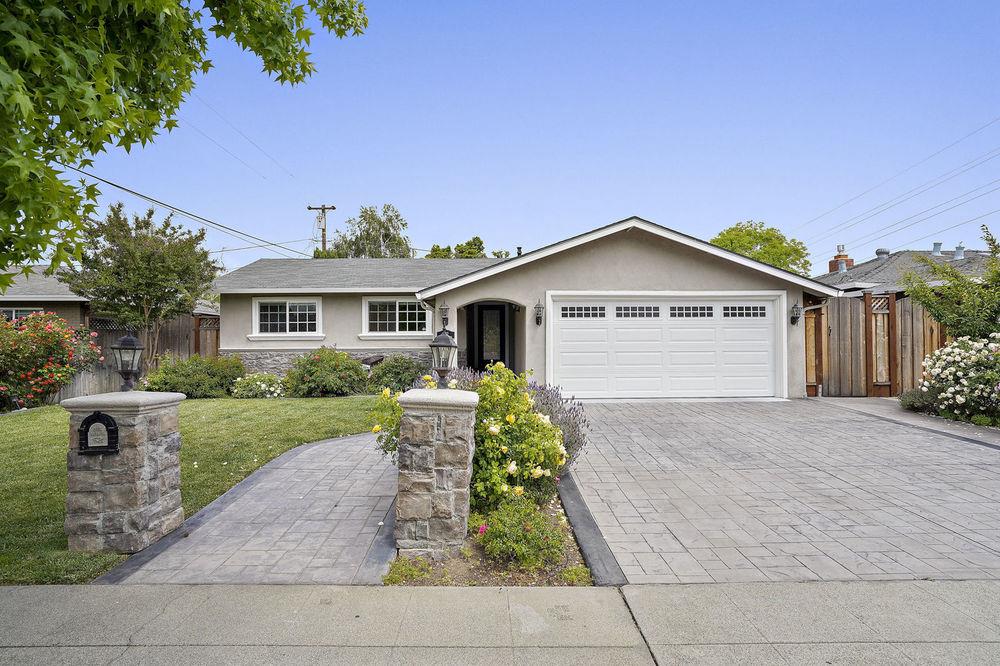 222 Thomas Drive Los Gatos, CA 95032 - Photo 15 of 28 a front view of a house with garden
