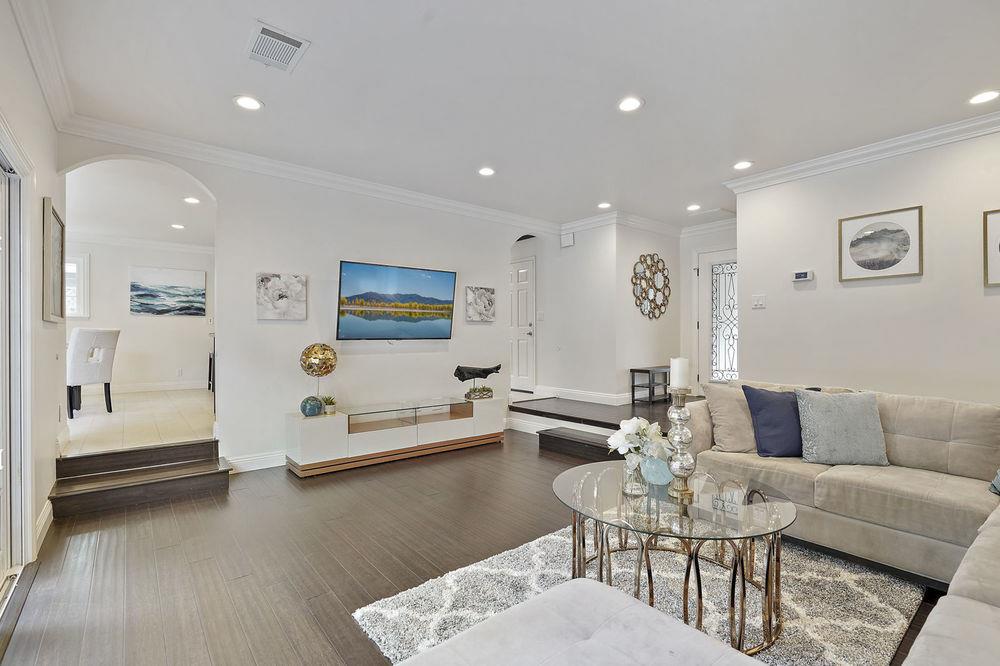 222 Thomas Drive Los Gatos, CA 95032 - Photo 18 of 28 a living room with furniture and wooden floor