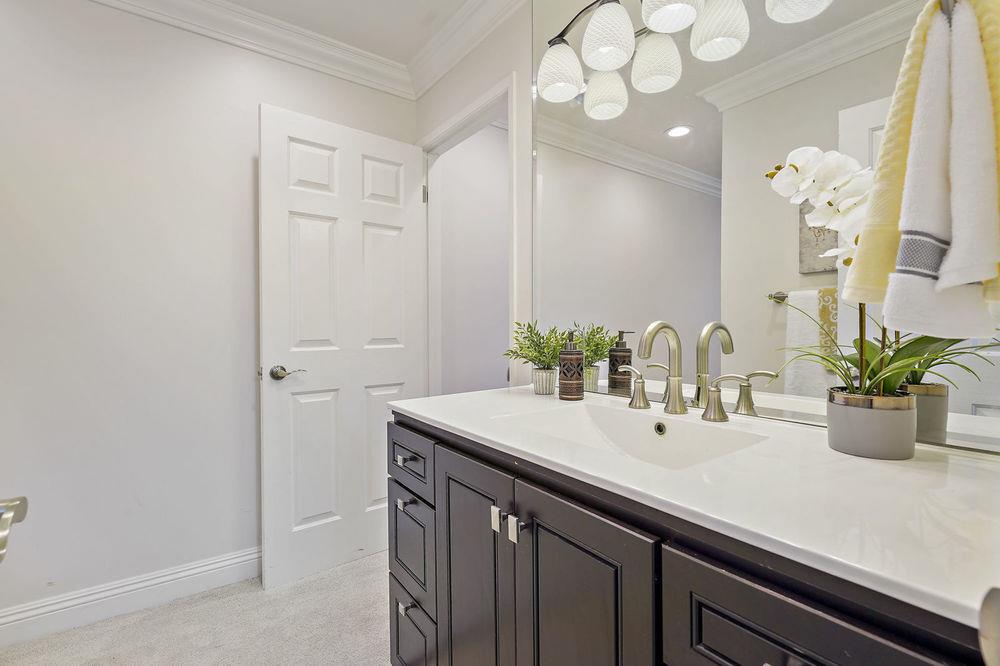 222 Thomas Drive Los Gatos, CA 95032 - Photo 20 of 28 a bathroom with a sink and a mirror