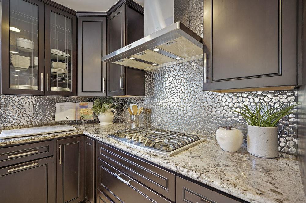 222 Thomas Drive Los Gatos, CA 95032 - Photo 24 of 28 a kitchen with a sink and a stove