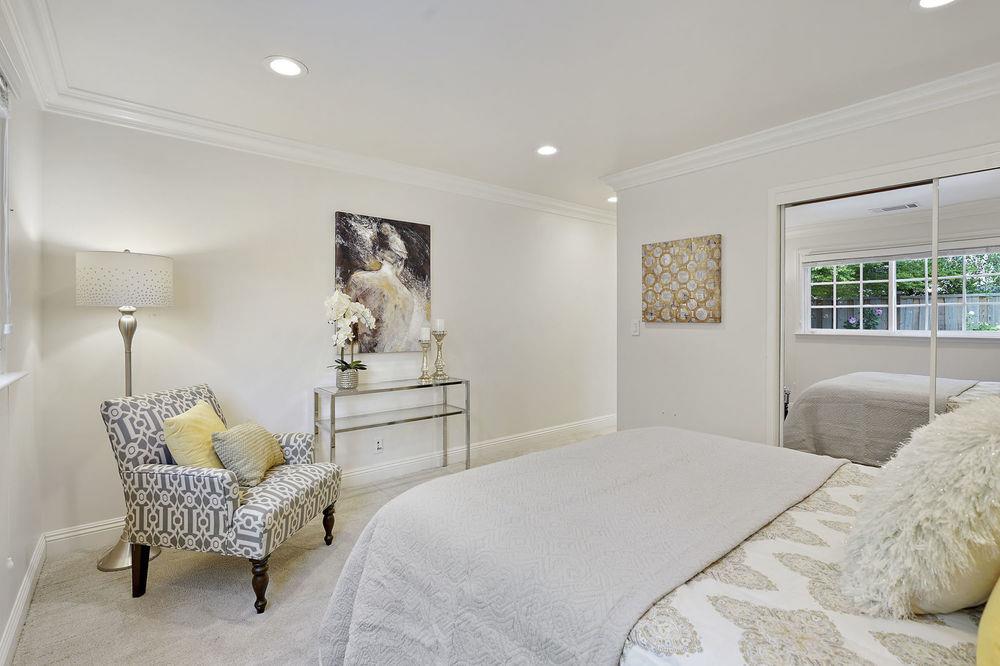 222 Thomas Drive Los Gatos, CA 95032 - Photo 6 of 28 a bedroom with a bed chair and window