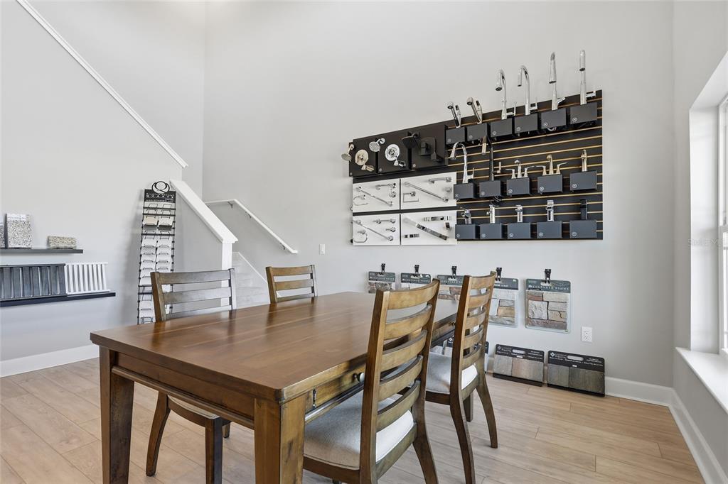 9533 Southwest 66th Lane Gainesville, FL 32608 - Photo 30 of 32 a view of dinning table and chairs in kitchen