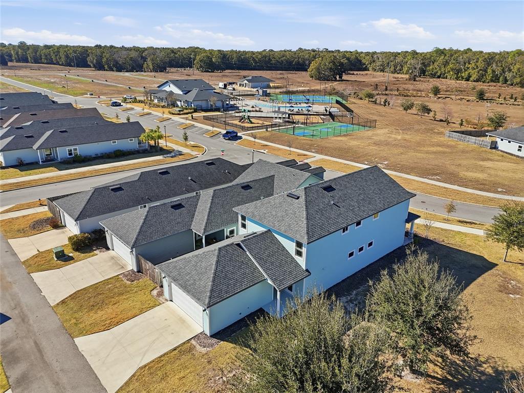 9533 Southwest 66th Lane Gainesville, FL 32608 - Photo 7 of 32 an aerial view of residential houses with outdoor space