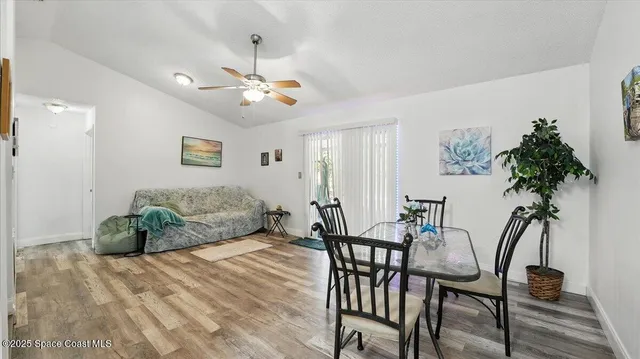 a bedroom with furniture and a chandelier