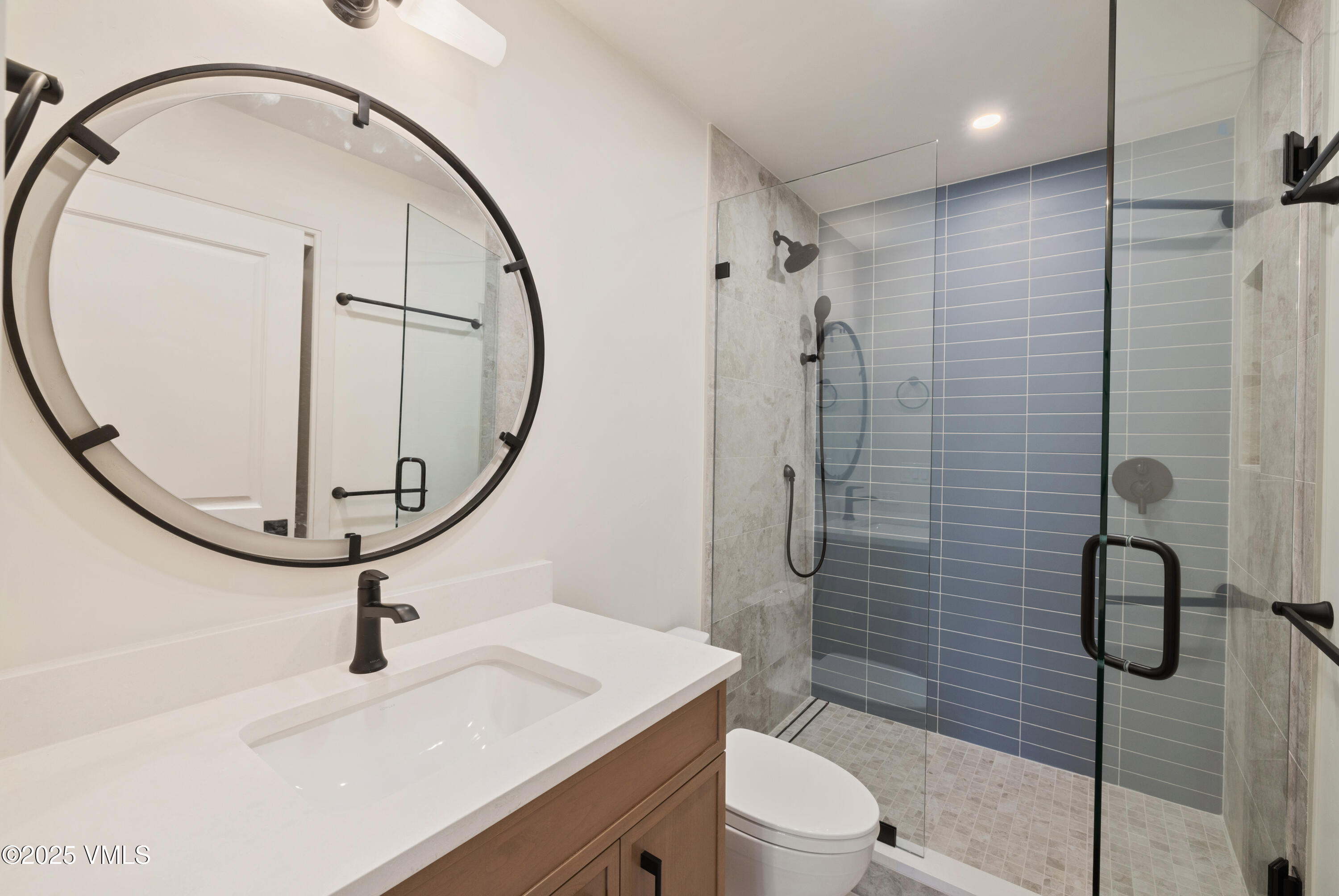 1881 Lions Ridge Loop, Unit 2 Vail, CO 81657 - Photo 23 of 41 a bathroom with a sink toilet and shower