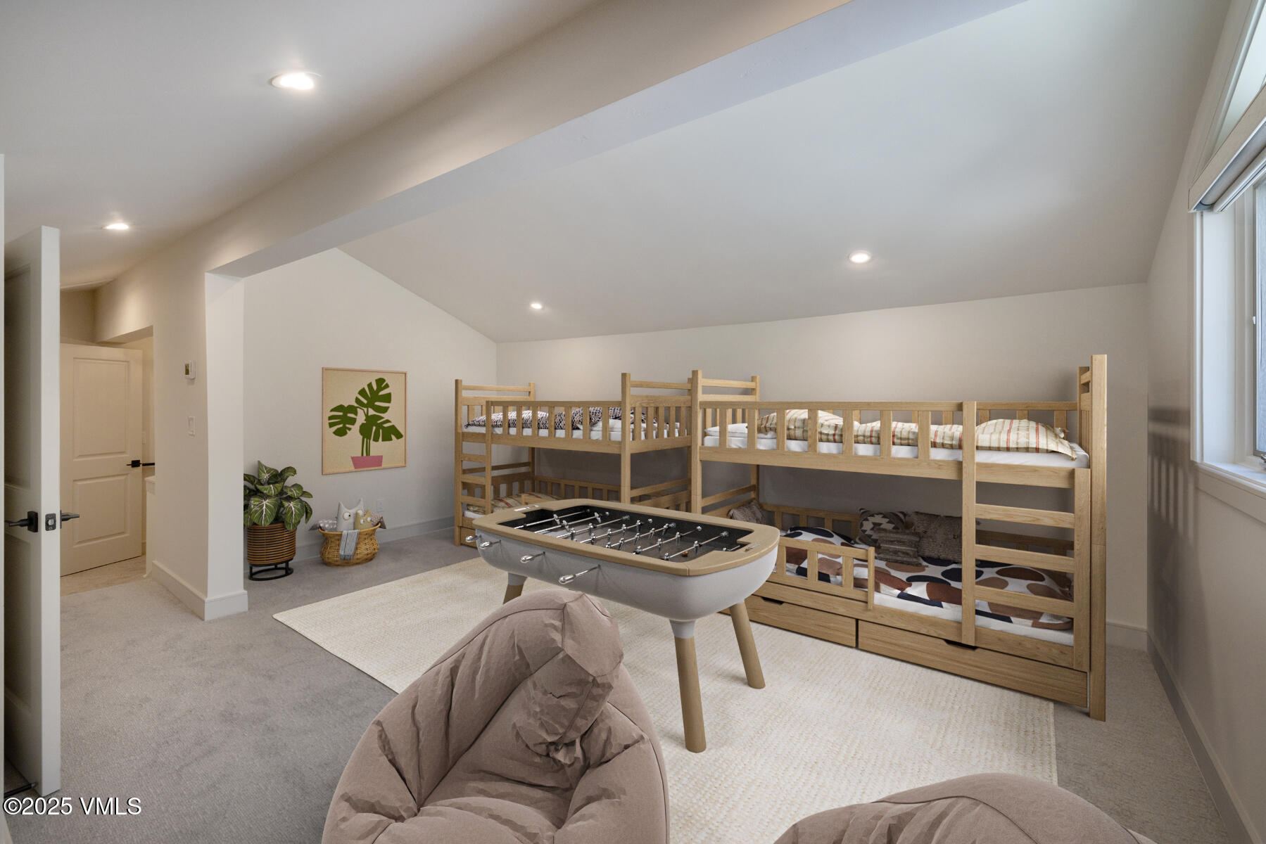 1881 Lions Ridge Loop, Unit 2 Vail, CO 81657 - Photo 26 of 41 a living room with furniture and a table