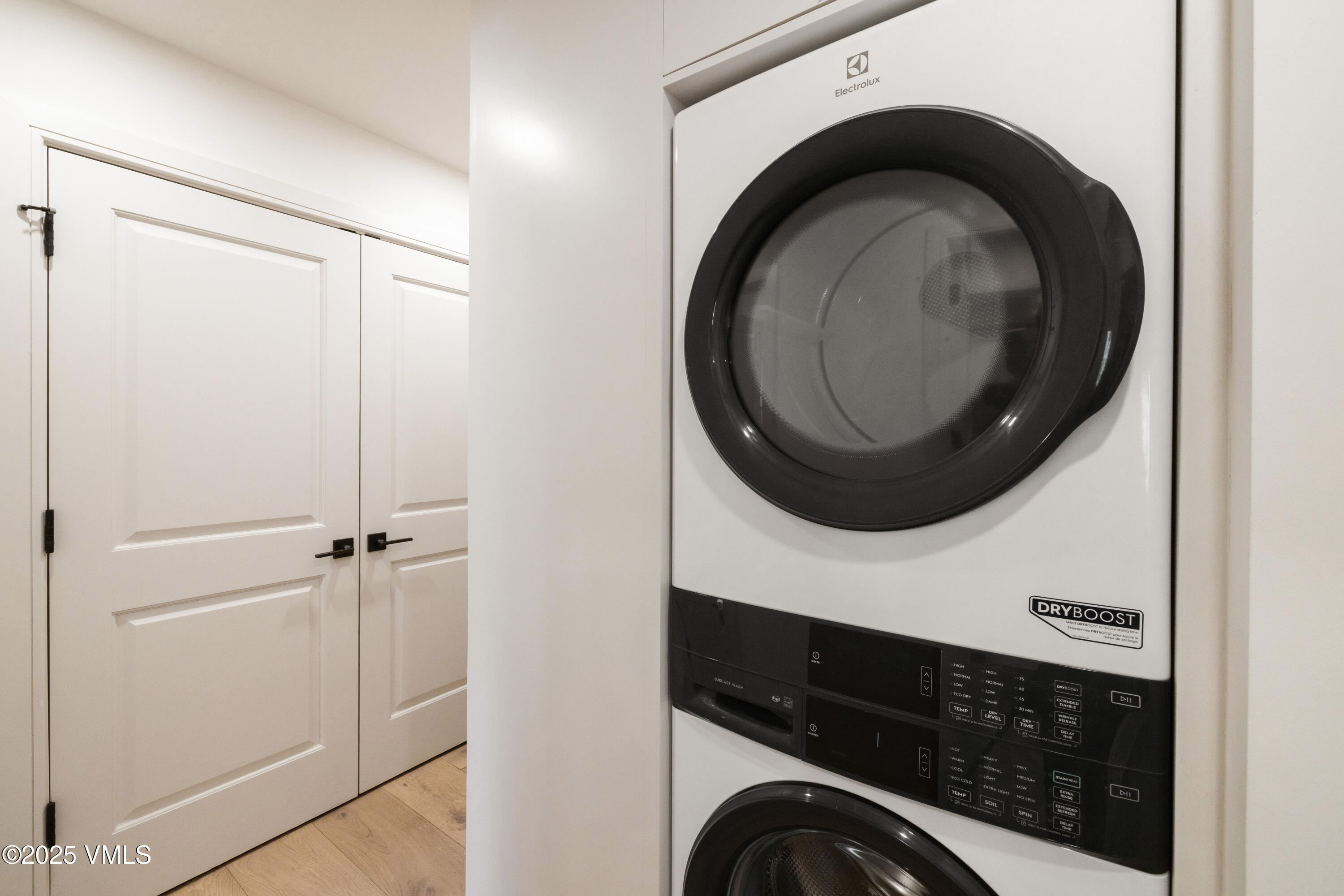 1881 Lions Ridge Loop, Unit 2 Vail, CO 81657 - Photo 29 of 41 a bathroom with a sink and a washer