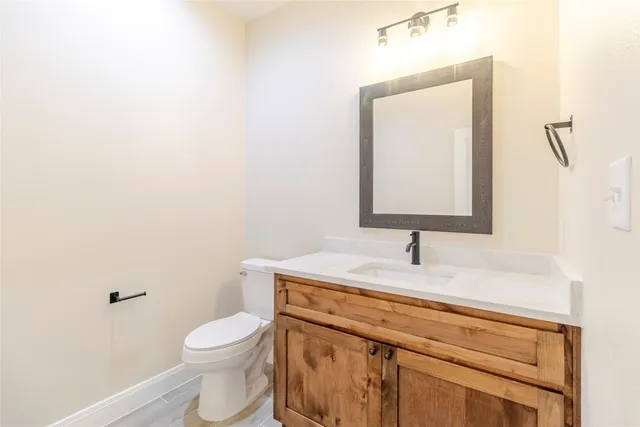 a bathroom with a sink and a toilet