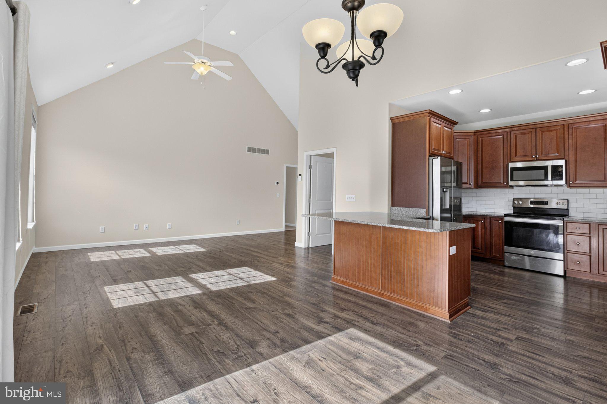 27 Sun Ridge Drive Felton, DE 19943 - Photo 18 of 61 Spacious open-concept living area.