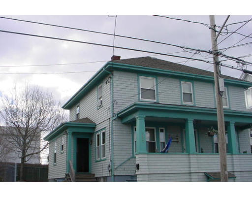 1457 Rodman Street Fall River, MA 02721 - Photo 1 of 16 a house that has a lot of windows