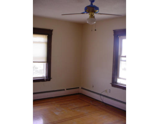 1457 Rodman Street Fall River, MA 02721 - Photo 9 of 16 a view of an empty room with a window