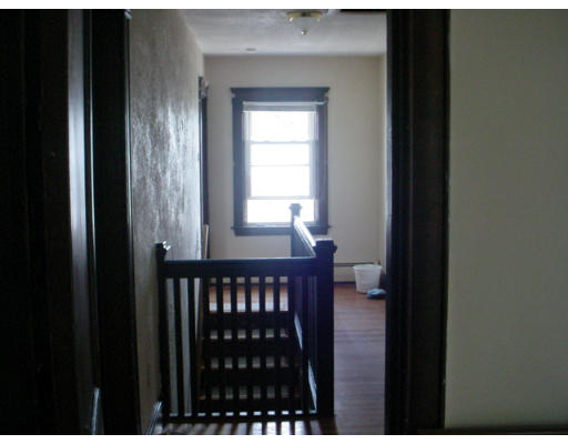 1457 Rodman Street Fall River, MA 02721 - Photo 10 of 16 a view of a black door and a window
