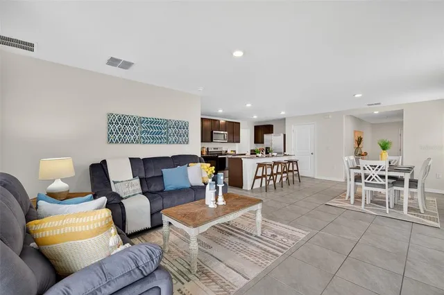 a bathroom with a sink toilet a mirror and shower