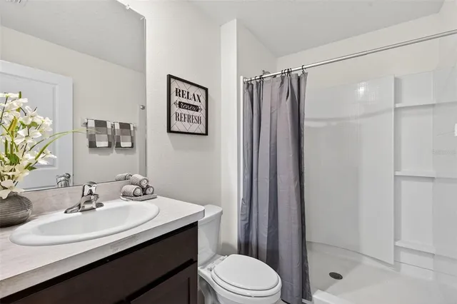 a workspace with furniture and mirror