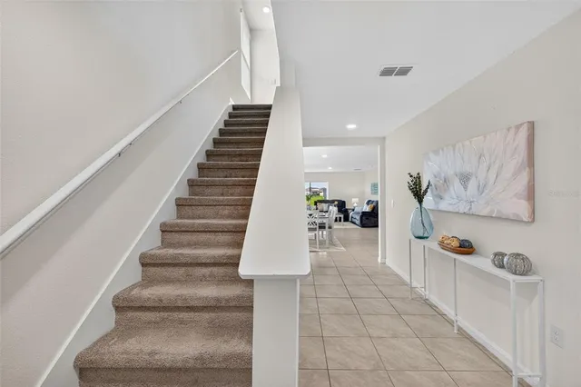 a bedroom with a bed and a desk