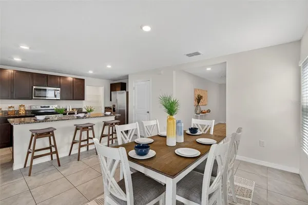a view of a dining room with furniture