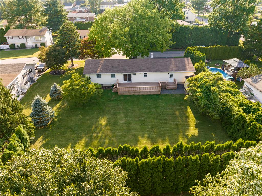 1644 9th Street Bethlehem, PA 18020 - Photo 27 of 27 A spacious, manicured backyard with a large deck invites outdoor living and recreation.