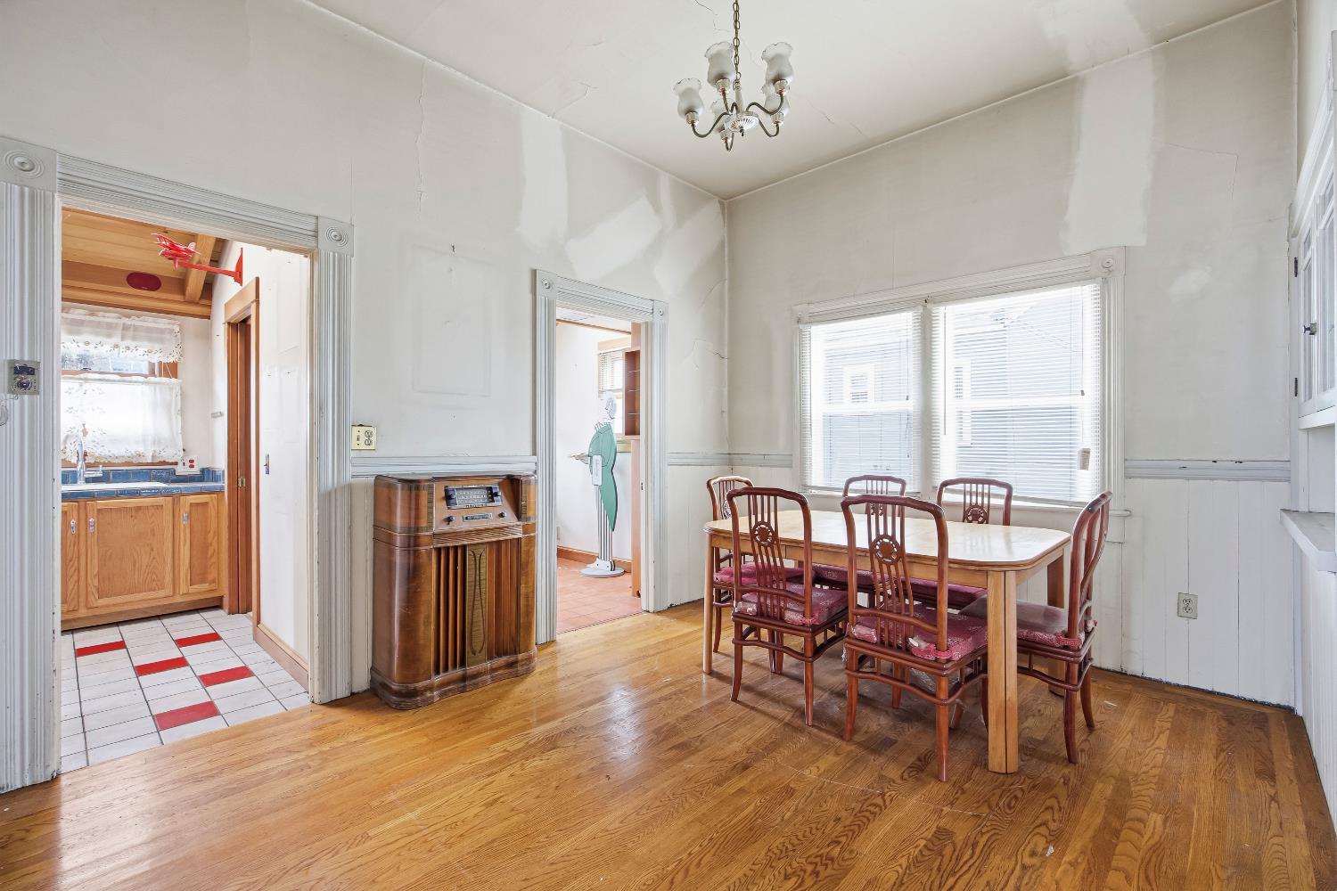 2013 Ninth Street Berkeley, CA 94710 - Photo 11 of 38 a view of a dining room with furniture window and wooden floor